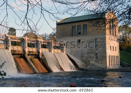 Water flowing over electric dam