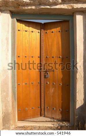 An old arabic door shot in an abandoned arabic village in Ras Al-Khiamah, United Arab Emirates.