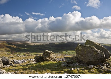 Atop Norber Erratics looking towards Wharfe Dale in Yorkshire Dales National Park