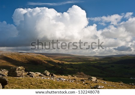View from Norber Erratics in Yorkshire Dales National Park down past Moughton Scar to Wharfe Dale