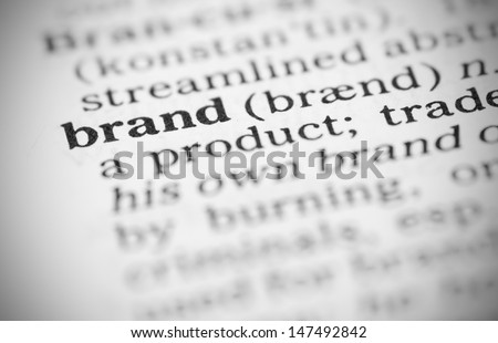 Macro image of dictionary definition of word brand