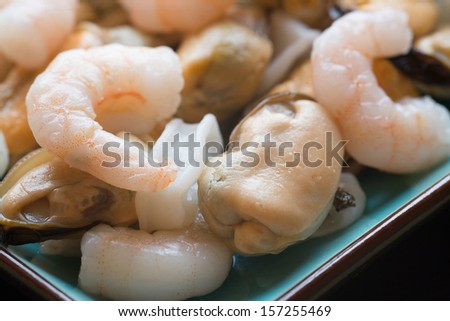 Seafood mix on platter with prawns squid and mussels