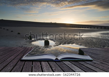 Creative concept pages of book Beautiful sunrise reflected in low tide water pools on beach landscape