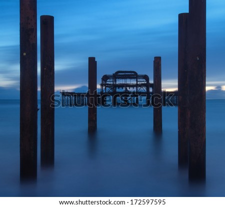 Old ruined pier long exposure landscape in blue hour