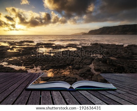 Book concept Stunning landscape ocean at sunset dramatic clouds