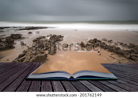 Long exposure landscape beach scene with moody sky Creative concept