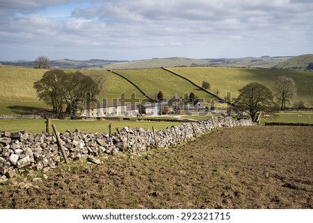 Beautiful landscape of Peak District in UK with famous stone walls