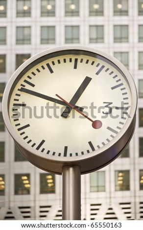Business concept financial district modern skyscrapers clock detail time is money concept