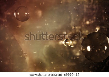 Oil on water photograph designed to appear like outer space background