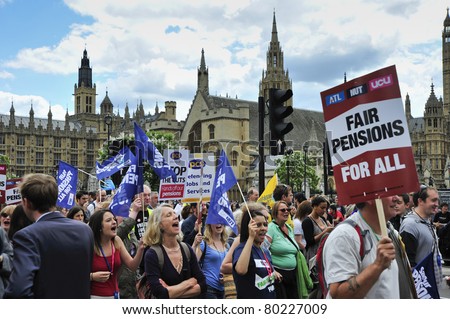 LONDON - JUNE 30; Unidentified members of unions demonstrate outside parliament against government proposals during a demonstration  organised by PCS and NUT trade unions in London on June 30, 2011