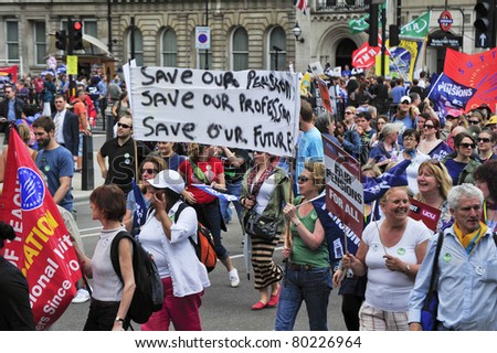 LONDON - JUNE 30; Unidentified members of trade unions protest against proposed spending cuts by the government during a demonstration  organised by trade unions in London on June 30, 2011