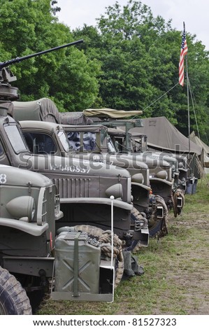 LONDON - JULY 21 - Line on US WW2 era vehicloes at War and Peace Show, world\'s largest collection of military vehicels and reenactments held each year on July 21st, 2011 near London, England