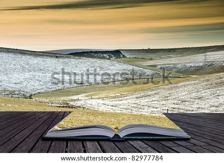 Creative concept idea of Winter landscape coming out of pages in magical book