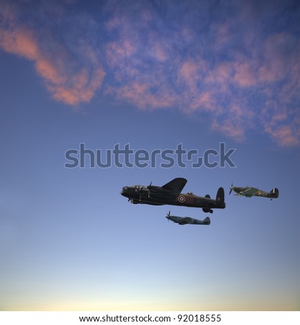 World War 2 RAF airplanes floying over lovely sunset golden hour