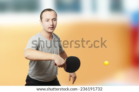 Table tennis game. Young man playing table tennis.