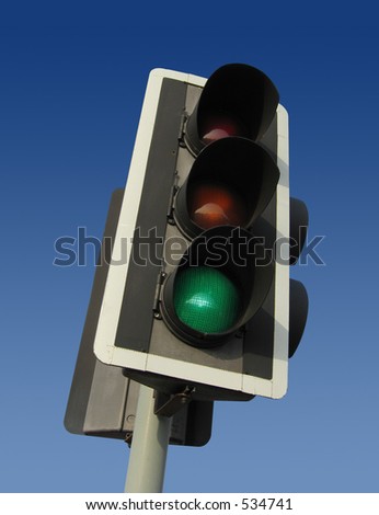 Traffic light showing the green light - contains clipping path for easy cut-out.