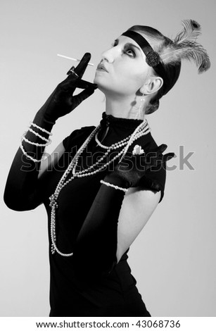 stock photo : Retro styled black and white fashion portrait of a young woman 