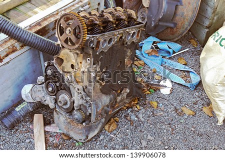 worn-out 4 cylinder car engine