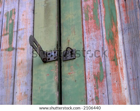 broken hasp and staple on old doors