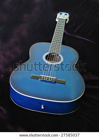 Blue guitar on Mauve Velvet