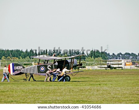 MASTERTON, NEW ZEALAND- NOVEMBER 14:WW1 Air Battle Remembrance Day:Aircraft and Dog-fight displays. Avro 504K being pushed to display site-November 14 2009, Masterton, NZ