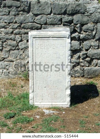 Tombstone with latin inscription in ancient roman settlement Dioclea, today Montenegro
