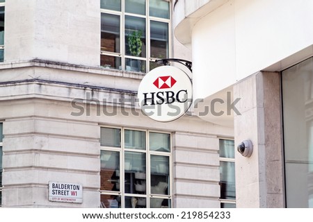 LONDON - JULY 1, 2014: The sign of HSBC bank on Oxford Street in London. Founded in 1865, HSBC is currently the world\'s second largest bank company.