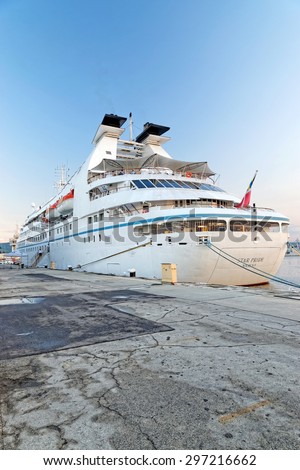 VARNA, BULGARIA - MAY 26, 2015: Passenger ship STAR PRIDE at dusk (Year Built: 1988, Flag: Bahamas) moored in Port of Varna.