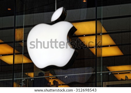 MUNICH, GERMANY - 4 AUGUST 2015: Apple store logo in Munich. It is the world\'s largest publicly traded company designs and sells consumer electronics and computer products.