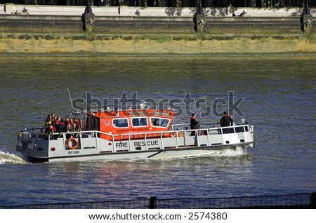 Fire brigade boat at the Thames river, London
