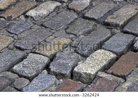 Close-up view from cobblestone street. Useful for texture or background.