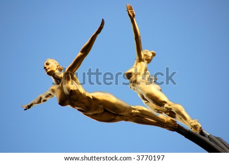 stock photo Two naked ballerinas Statue on a building London