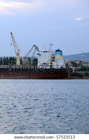VARNA, BULGARIA - JULY 19: Cargo ship YAN DANG HAI (Flag: China, IMO: 9488229) moored in Port of Varna and being loaded with goods on July 19, 2010 in Varna, Bulgaria.