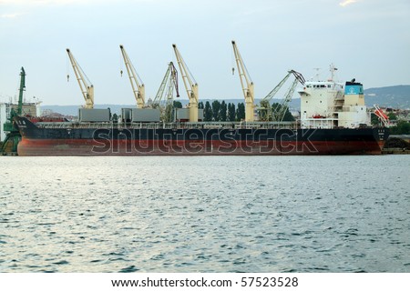 VARNA, BULGARIA - JULY 19: Cargo ship YAN DANG HAI (Flag: China, IMO: 9488229) moored in Port of Varna and being loaded with goods on July 19, 2010 in Varna, Bulgaria.