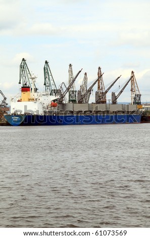 VARNA, BULGARIA - SEPTEMBER 05: Cargo ship HAN HAI (Year Built: 1996, DeadWeight: 45644 t, Flag: Panama) is loading 44000 t of wheat in Port of Varna-East on September 05, 2010 in Varna, Bulgaria.