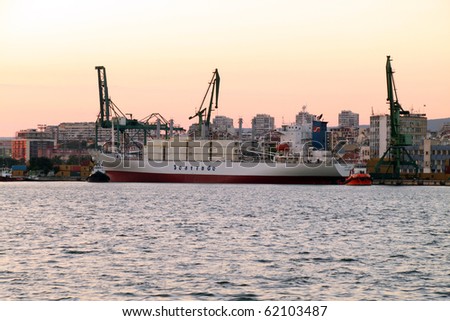 VARNA, BULGARIA - SEPTEMBER 30: Cargo ship HOPE BAY (Year Built: 1996, Flag: Neth. Antilles) is loaded with containers in Port of Varna-East on September 30, 2010 in Varna, Bulgaria.