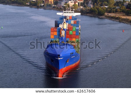 VARNA, BULGARIA - SEPTEMBER 26: Turkish cargo ship HILDE A (Year Built: 2005, DeadWeight: 22033 t) sails into Port of Varna-West to be loaded with containers on September 26, 2010 in Varna, Bulgaria.
