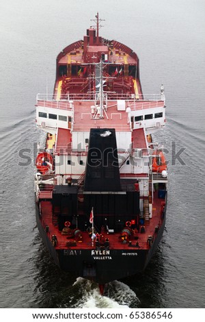 VARNA, BULGARIA - NOVEMBER 17: Cargo ship EYLEN (Built: 1981, Flag: Malta) sails into Port of Varna-West to be loaded with 6000 tons of vitriol on November 17, 2010 in Varna, Bulgaria.