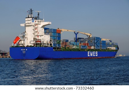 VARNA, BULGARIA-MAR 14: Turkish cargo ship HILDE A (Year Built: 2005, Dead Weight: 22033 t) sails away into open sea after a short stay in Varna-west port on March 14, 2011 in Varna, Bulgaria