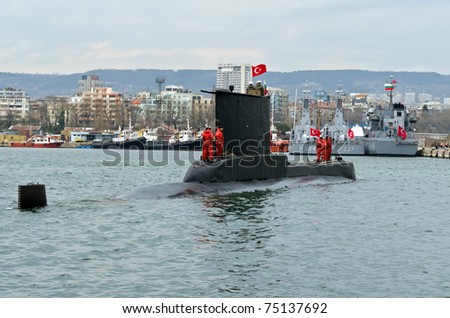 VARNA, BULGARIA - APR 08: Crew members stand on board the Turkish submarine DOLUNAY (S-352) on April 08, 2011 in Varna, Bulgaria. The vessel is taking part in Starfish 2011 Naval exercise.