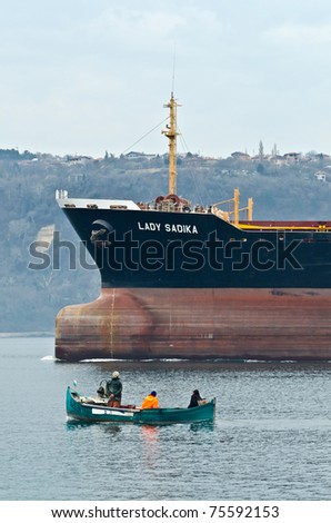VARNA, BULGARIA - APR 08: Cargo ship LADY SADIKA (Year Built: 1984, Flag: Malta) sails away into open sea after a short stay in Varna-west port on April 08, 2011 in Varna, Bulgaria.