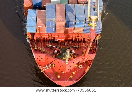 VARNA, BULGARIA - MAY 13: Cargo ship ALEXANDER SIBUM (Flag: Antigua Barbuda, Year Built: 2006) sails to Port of Varna-West to load containers on May 13, 2011 in Varna, Bulgaria.