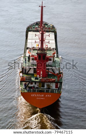 VARNA, BULGARIA - MAY 13: Cargo ship GULIZAR ANA (Year Built: 2005, Flag: Turkey) sails into Port of Varna-West to load 3000 tons of heavy soda on May 13, 2011 in Varna, Bulgaria.