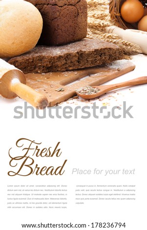 fresh bread on cutting Board, scoop with flower and seeds isolated over white