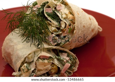 lavash on red shining plate with dill