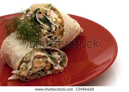 lavash on red shining plate with dill