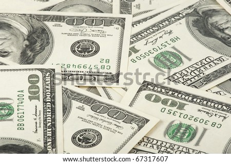 heap of old 100 dollars banknotes