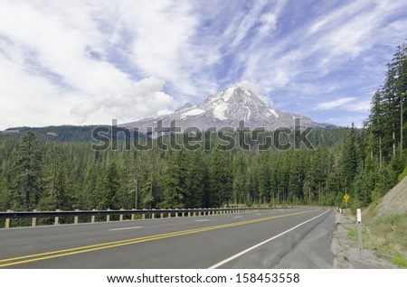 View of volcanic Mt. Hood, highest mountain in Oregon (11,249 feet, or 3,429 meters) and training ground for winter athletes, from Mount Hood Highway No. 26 in September