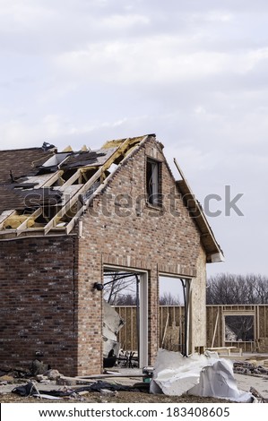 WASHINGTON, ILLINOIS, USA - MARCH 21, 2014: Corner of a single-family house hit by a tornado on November 17, 2013, that destroyed entire neighborhoods in the area.