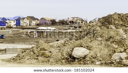 WASHINGTON, ILLINOIS, USA - MARCH 31, 2014: Various stages of recovery are evident in this neighborhood in the aftermath of a tornado that left widespread devastation on November 17, 2013.